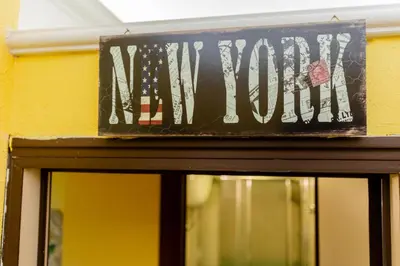 a sign that says my house on top of a door at Oscar 3 in Rome