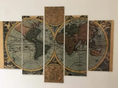 a map of the world hanging on a wall at La finestra sul Colosseo B&B 1 in Rome