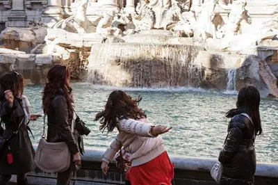 a group of women standing in front of a fountain at Holiday flat in central location in Rome in Rome