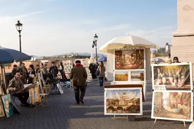 a group of people walking around an outdoor market at Holiday flat in central location in Rome in Rome