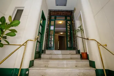 a stairway leading to a building with a door at Noemi's Rooms Guest House in Rome