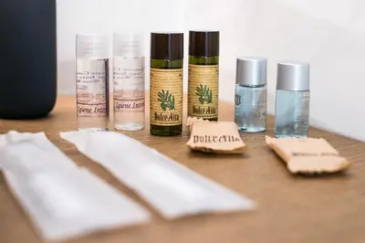 a group of bottles of moisturizers sitting on a table at St. Peter Manor in Rome
