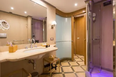 a bathroom with a sink and a shower at Giuditta Suite 121 Trastevere Roma in Rome