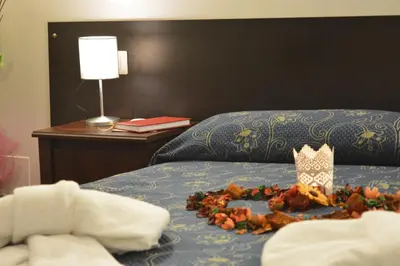 a pile of food on a bed in a hotel room at Locanda Otello in Rome