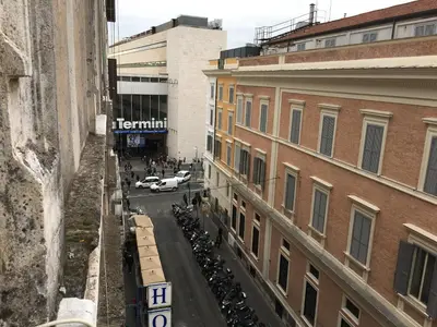 a view of a city street with a group of motorcycles at Locanda Otello in Rome