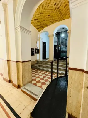 an empty building with a staircase and a lobby at B&B Rome Terminal House in Rome