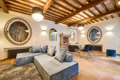 a living room with a couch and a table at Domus Luxury Gianicolo in Rome