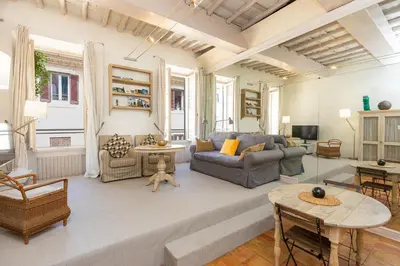 a living room with a couch and a table at Rental in Rome Leonardo da Vinci in Rome