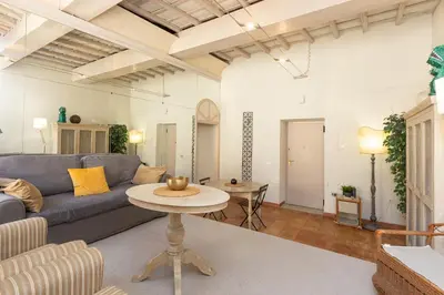 a living room with a couch and a table at Rental in Rome Leonardo da Vinci in Rome