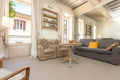 a living room with a couch and a table at Rental in Rome Leonardo da Vinci in Rome