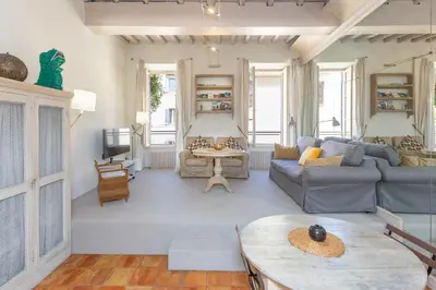 a living room with a couch and a table at Rental in Rome Leonardo da Vinci in Rome