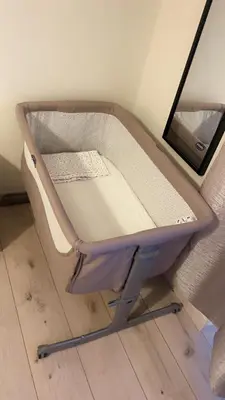 an empty bed sitting on the floor in a room at Vatican Sofia house in Rome