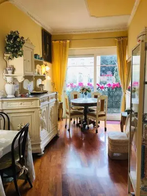 a dining room with a table and a window at B&B Seneca in Rome