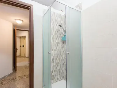 a shower in a bathroom with a glass door at Apartment Aurelia by Interhome in Rome