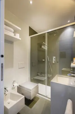 a bathroom with a shower and a sink and a toilet at Navona Stay in Rome