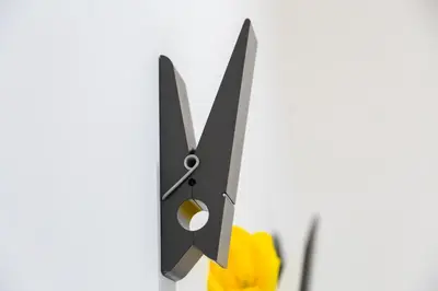 a pair of scissors and a yellow flower at Vasari's Home in Rome
