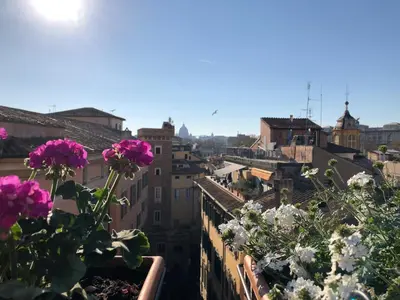 a view of a city with a mosque in the background at Stelletta 1a in Rome