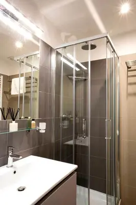 a bathroom with a shower and a sink at Four Elements in Rome