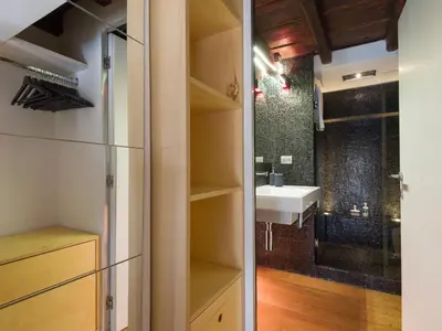 a small bathroom with a sink and a sink at Loft in Trastevere in Rome
