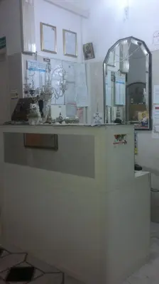 a counter in a room with a mirror at Hotel Stadler 2 in Rome