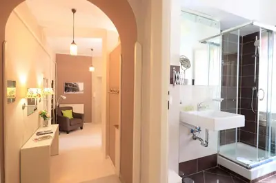 a bathroom with a sink and a shower at Pamphili Park Romantic Retreat in Rome