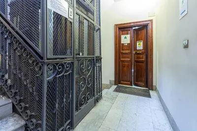 an entrance to a house with a door and a staircase at B&B A Picture of Rome in Rome
