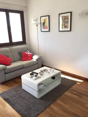 a living room with a couch and a coffee table at Aurelia House in Rome