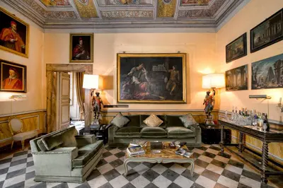 a living room with a couch and a table at Residenza Ruspoli Bonaparte in Rome