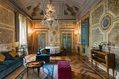 a living room with a couch and a table at Residenza Ruspoli Bonaparte in Rome