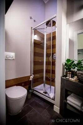 a bathroom with a shower and a toilet at Chic & Town Luxury Rooms Piazza di Spagna in Rome