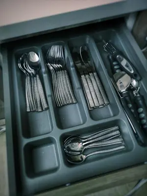 a tray with forks and spoons and other utensils at Casa Vacanza Katiuscia in Rome