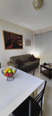 a bathroom with two windows and a sink and a mirror at Visconti apartment. in Rome