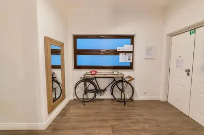 a bike parked in a room with a window at Rhome Vintage Holidays San Pietro in Rome
