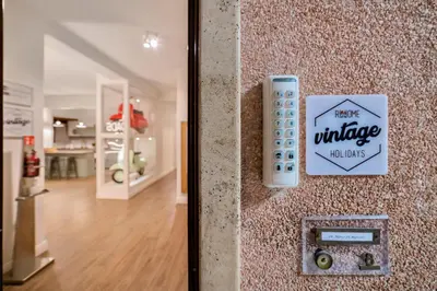 a remote control on the wall of a house at Rhome Vintage Holidays San Pietro in Rome