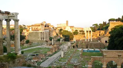 a view of the ruins of the ancient city at Roma center Fori Imperiali Raffy's charming Suite in Rome