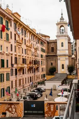 a view of a city with buildings and a clock tower at GuestHost - Vatican Museums Cozy Flat x4 in Rome