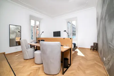 a dining room with a table and chairs at Youroom Abruzzi in Rome