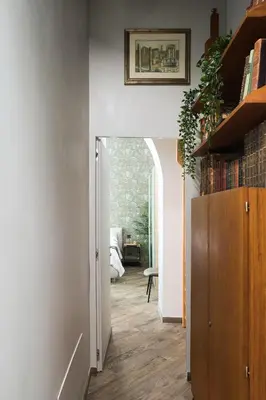 a hallway with a door leading to a bedroom at Horti Sallustiani Roma in Rome