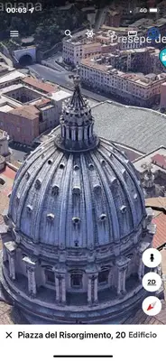 a large building with a tower on top of it at Zeus Inn - Una finestra sul Vaticano in Rome