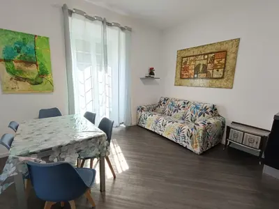 a kitchen with a table and chairs in a kitchen at Vatican City San Peter quiet and lovely apartment in Rome