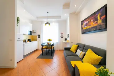 a living room with a couch and a table at *****AmoRhome***** New Luxury apartment in the heart of Rome in Rome