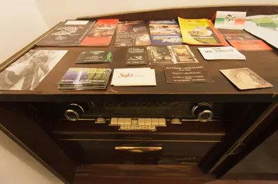 a table with a bunch of books on it at Mr Frills in Rome