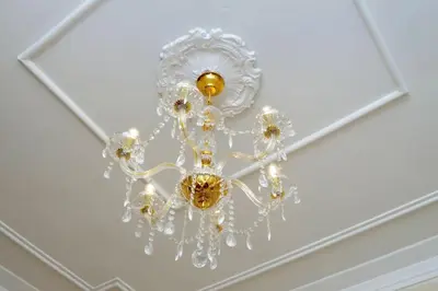 a chandelier hanging from a ceiling in a room at AL Holiday Home in Rome