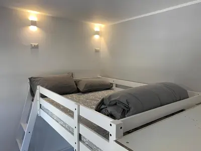 a bed in the corner of a room at A casa di Elly in Rome