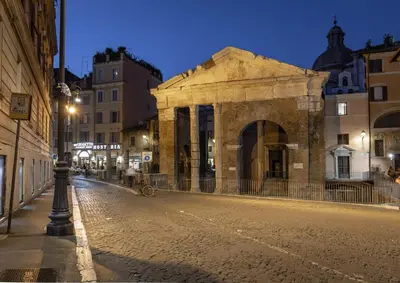 a building on the side of a street at night at NEMAN Maison Experience I Pantheon in Rome
