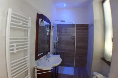 a bathroom with a sink and a shower at Casa Ferrari Testaccio e Trastevere Wi-Fi free in Rome