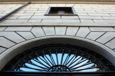 an archway of a building with a window at Roma Resort Termini in Rome