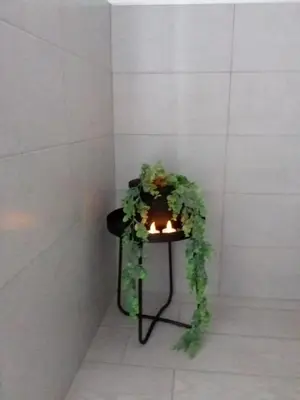 a table with a wreath on it with a candle at Vic Pigneto, Luxury House Terrace Roma in Rome