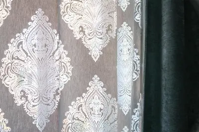 a close up of a curtain with white lace at Vic Colosseo, Centro Storico Roma in Rome