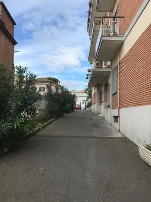 an empty alleyway between two buildings in a city at Da Nonna Maria in Rome